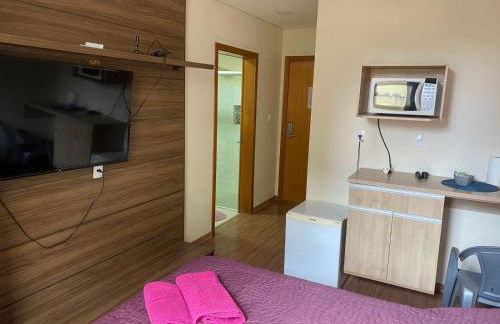 Flats da Júnia excelente localização, wi-fi, tv, ar, frigobar, garagem - Foto 3