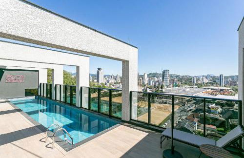 Village Lofts a 5 minutos da Vila Germânica com piscina aquecida no terraço - Foto 1