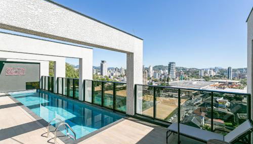 Village Lofts a 5 minutos da Vila Germânica com piscina aquecida no terraço - Foto 1