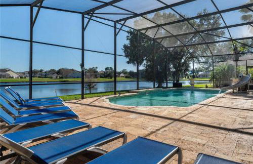 BRAND NEW! Lakefront 9BR Pool Hot Tub Outdoor Kitchen BBQ Theater 2 miles Disney - Foto 1