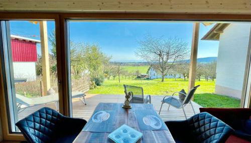 Zweistöckiges Natur-Holzhaus mit Berg- & Seesicht - Foto 4, Garden view