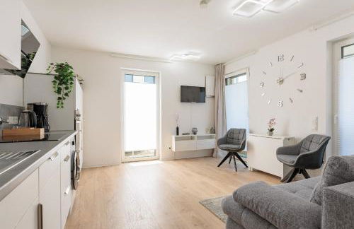 Modernes Apartment mit Terrasse & Garten, Parkplatz & 24h Self-Check-in - Foto 8