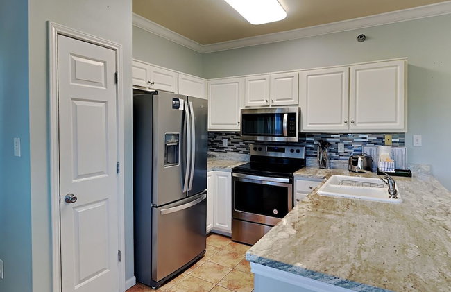 Romar Lakes #205E by Southern Vacation Rentals - Photo 13