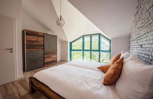 Industrie Stil Apartment unweit vom See - Foto 32