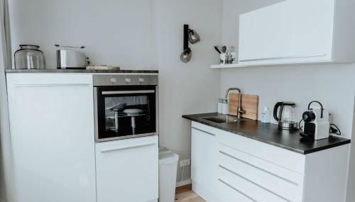 2-Zimmer City Apartment 57m² mit King Size Bett und Küche - Foto 3