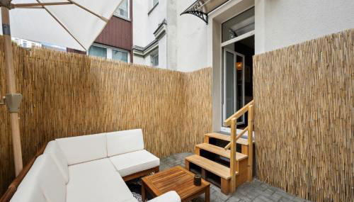 Gemütliches Apartment - hochwertiges Boxspringbett, privater Parkplatz, Terrasse, komplette Küche, WLAN, 40 Zoll HD TV - Foto 4