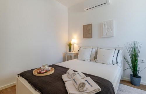 Sleek & Modern Flat w/ Private Garage by HostWise - Photo 13