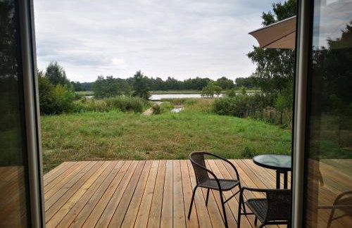 Dom nad jeziorem z prywatnym pomostem i linią brzegową - Foto 20