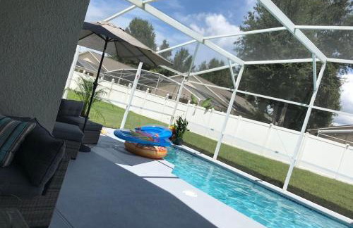 Beautiful 5BR home near Disney with private pool, large yard & BBQ - Foto 19