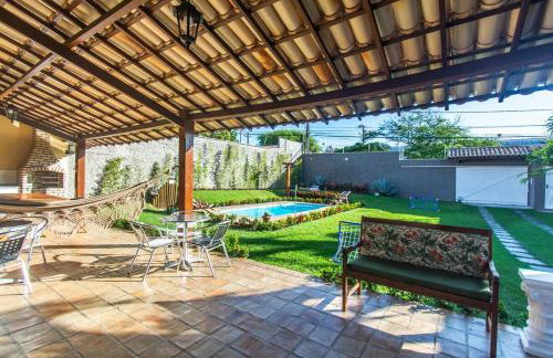 Casa com piscina, churrasqueira e jardim em Lauro de Freitas - até 11 pessoas - Foto 4