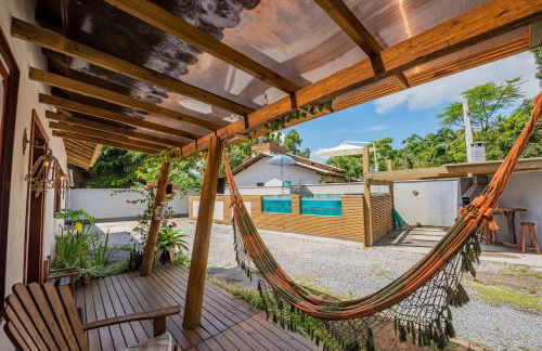 Casa Rústica com Piscina Privativa, Banheira de Hidromassagem, Ar-Condicionado, Pet friendly - Refúgio na Natureza a 5 Minutos do Centro de Imbituba, Perfeita para Famílias e Grupos - Photo 57