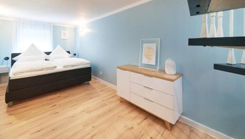 Design Apartment mit kostenfreiem Garagen Parkplatz im Zentrum - Foto 5