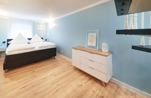 Design Apartment mit kostenfreiem Garagen Parkplatz im Zentrum - Foto 5