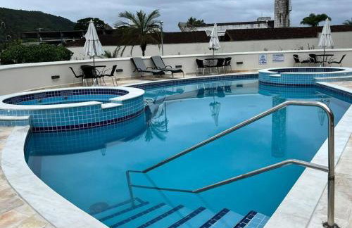 Apartamento 23A para 6 pessoas com Piscina e Churrasqueira no Cond Torremolinos Beach a 80m para Pé na areia na Praia da Enseada Ubatuba - Foto 2