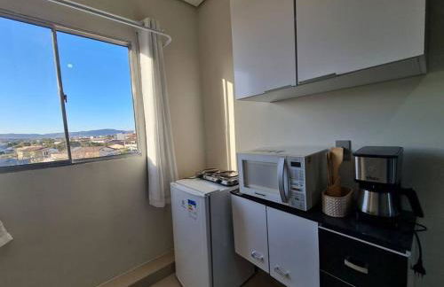 Kitnet404 central, com tv smart,linda vista para janela - Foto 5