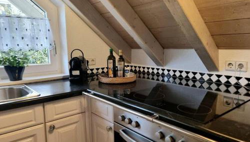 Dachgeschosswohnung im Grünen - Foto 4