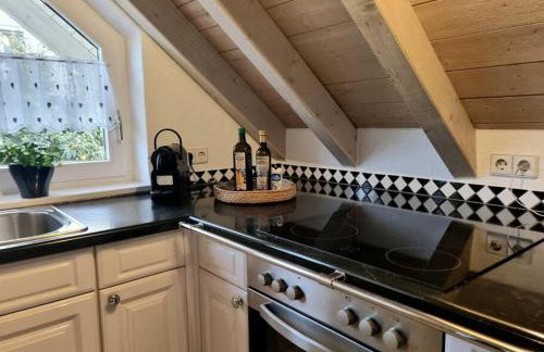 Dachgeschosswohnung im Grünen - Foto 4