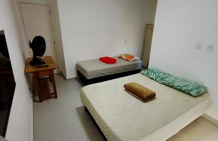 Suíte privativa aconchego a alguns passos da praia - Foto 3