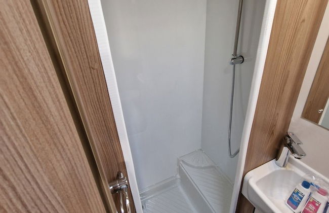 Brand new Touring Caravan Sited all Setup Ready - Photo 12