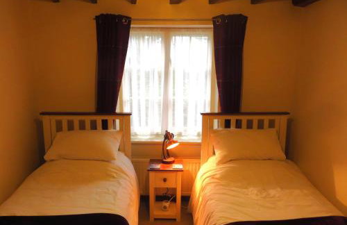 The Old Stores, a Grade II listed cottage in the delightful village of Georgeham, is ideal for beach, surfing, walking & cycling holidays - Foto 8