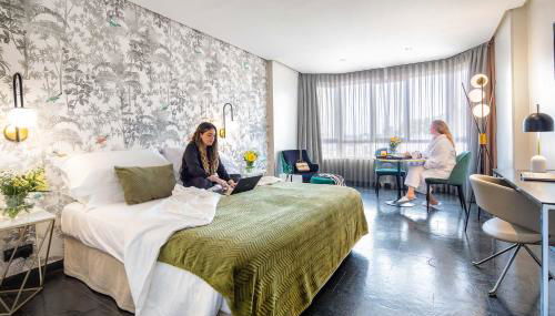 Apartosuites Jardines de Sabatini - Photo 4