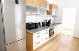 LETA Homes - Zentrale, moderne Wohlfühlwohnung mit flexiblem, kontaktlosem Zugang & eigenen Parkplätzen - Foto 1