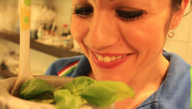 Smelling fresh basil