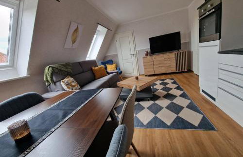 Haus-Fehmarn-am-Dorfteich-|-Wohnung-2-West - Foto 1