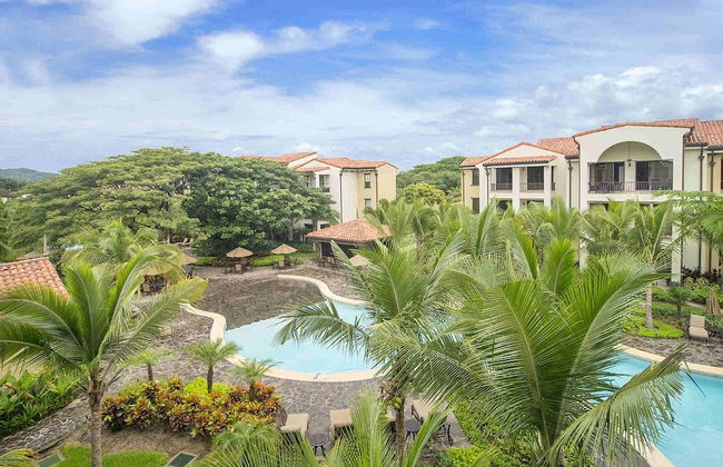 Impressively designed and decorated 3rd-floor space overlooking pool in Coco - Photo 21