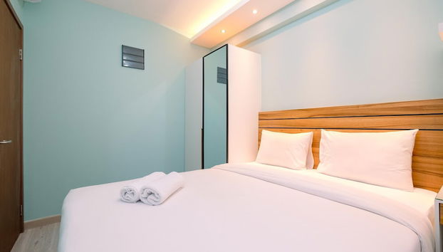 Best Homey and Comfort 2BR at Podomoro Golf View Apartment - Photo 5, Chambre