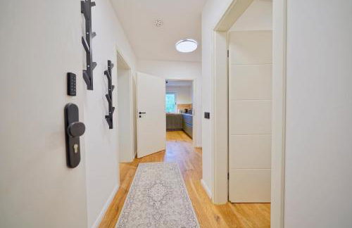 EDLER WOHNRAUM Luxuriöses Apartment mit Balkon, Boxspringbett, Kaffeevollautomat, Lift & Parkplatz - Foto 34