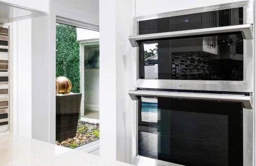 Spectacular Miami- Htd Pool,5 Bdrooms ,MiniGolf, Playground, Baby Items, BBQ - Photo 49