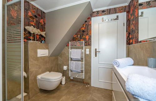 Gemütliche Wohnung unter Reet mit Pool und Sauna in Keitum - Photo 16