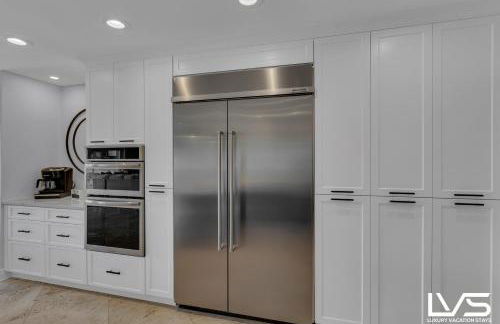 New Royal 80ft Waterfront Wlk2Beach HotPool Spa KitchenBBQ - Foto 12