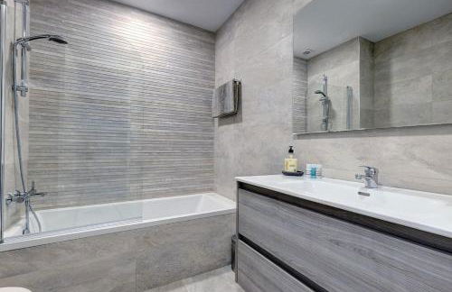 Stylish Penthouse Duplex at Matchroom Country Club - Photo 39