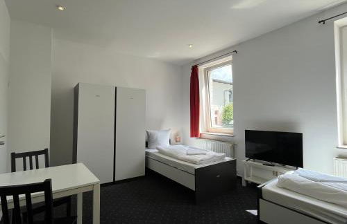 MonteurzimmerKING Leipzig-West - Foto 7