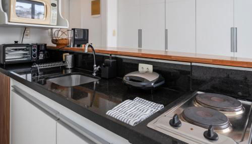 32-COP · CurtaCopacabana: Studio funcional com tudo embaixo - Foto 4