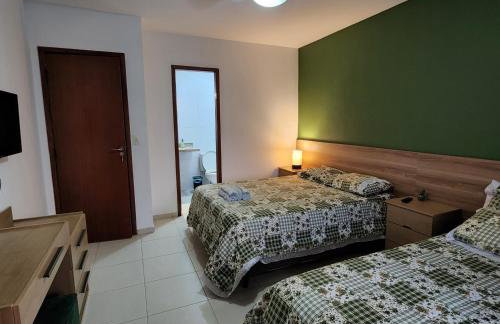 Casa confortável pertinho da praia com garagem e quintal - Foto 11