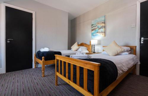 Coasters Holiday Apartments - Foto 16