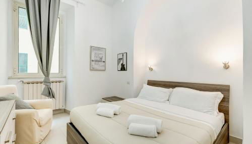 CasaVibe Colosseo - Foto 5, furniture, towels, wardrobe