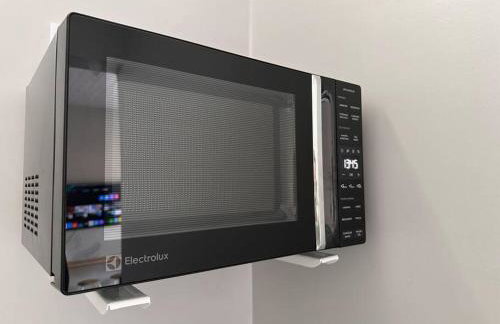 O MELHOR PREÇO - Suíte 5 min do Aeroporto - Photo 6