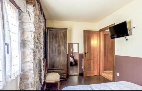 La Tienda de Abajo - Apartamentos acogedores con calefacción, parking y vistas al Valle de Soba - Foto 9