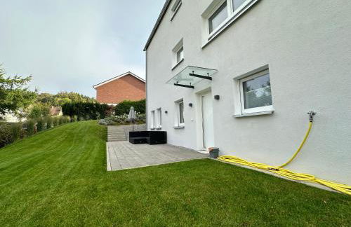 Modernes Apartment mit eigener Terrasse & Garten - Foto 6