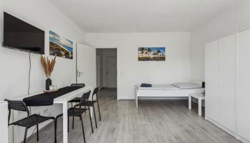 Work & Stay Apartment mit Balkon in Bergkamen - Foto 5, wardrobe