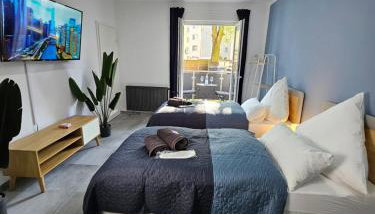 Modern Homes - Voll ausgestatte Wohnung - Balkon - Hotelbetten - 4K TV - WLAN - Foto 2, towels