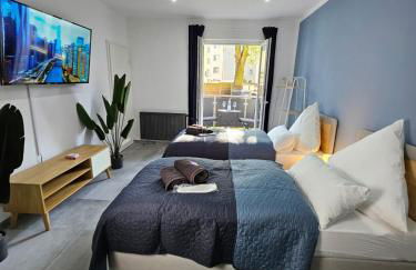 Modern Homes - Voll ausgestatte Wohnung - Balkon - Hotelbetten - 4K TV - WLAN - Foto 1