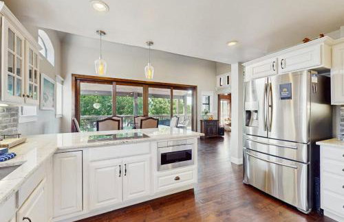 Opulent Waterfront Home with Dock, Firepit & Stunning River View - Photo 10