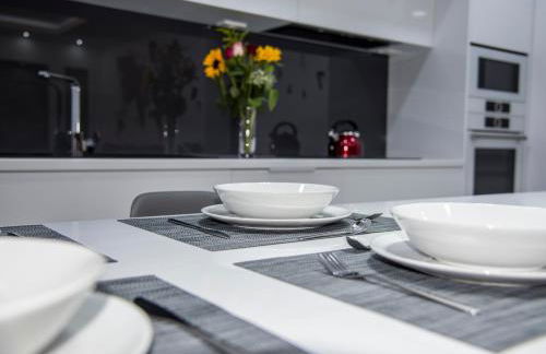 TWIN'S HOME LUXURY SUITES - Photo 10