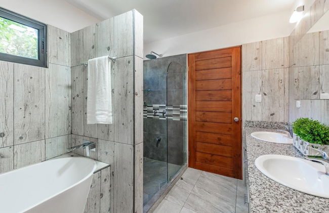 Ultramodern Townhome with an Inviting Coastal Design and Lush Outdoor Oasis with a Private Pool - Photo 22