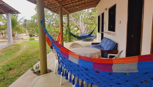 CHALE PERTO DA PRAIA COM DUAS SUITES E VARANDAO - Foto 1